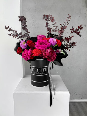 Luxury Valentines Day Flowers. A huge mix of romantic, girly, luxe & vibrant tone florals, combing both fresh & lasting flowers in a personalised flower box cylinder - the most incredible gift or centrepiece! Luxury Flowers. Geelong Florist. Melbourne Florist. Valentines Day Flowers. Mothers Day Flowers. Black flower hat box. Personalised gift box. Personalised Flowers.